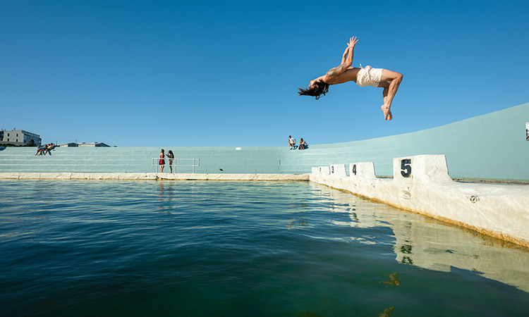 Jumping into the Newcastle Beach Pool - Sydney's Best Road Trips