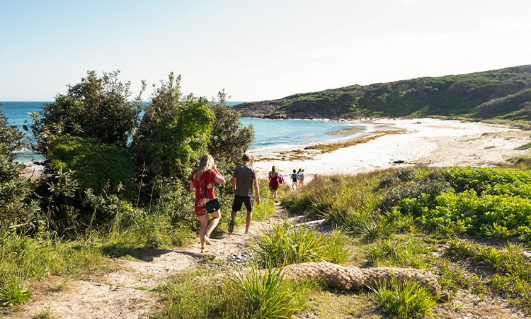 Exploring the beach near Port Stephens YHA - best road trips Sydney