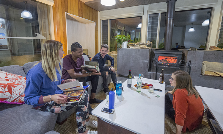 Sitting by the fire at Apollo Bay Eco YHA
