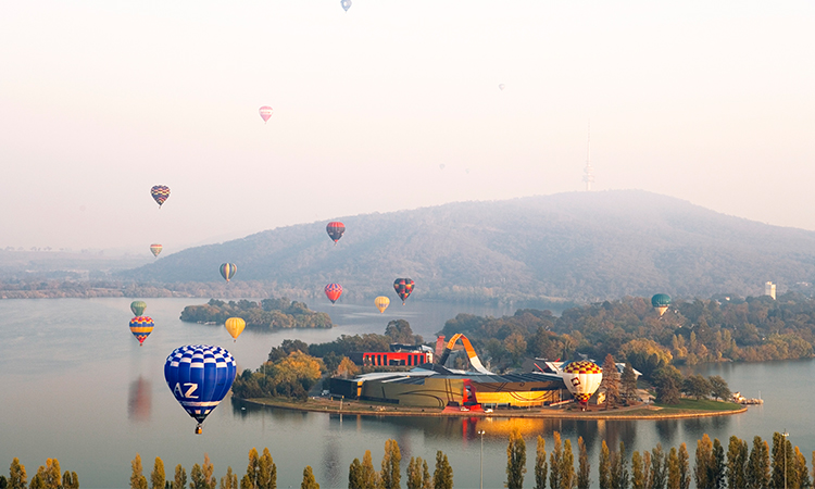 See the Sunrise from a hot air balloon in Canberra - Credit Tourism Australia