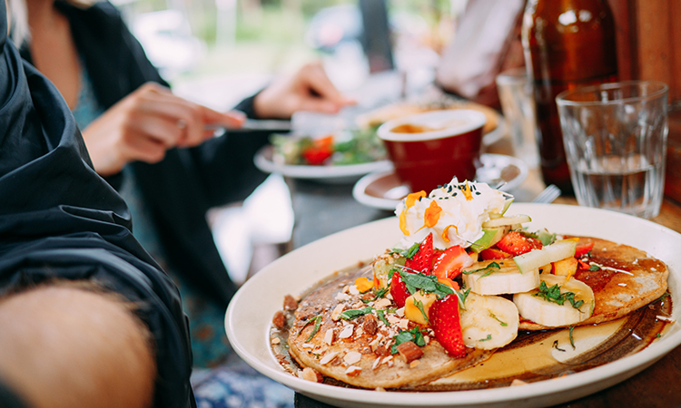 Folk at Byron Bay - image via Unsplash